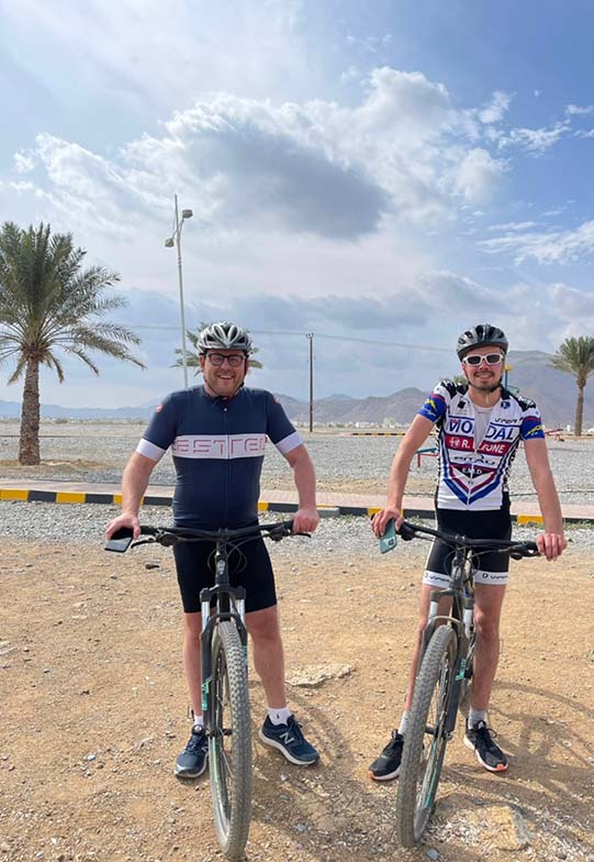 guests cycle ride during al hamra heritage tour