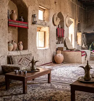 Inside Bait Al Safah heritage house museum in Al Hamra with traditional furnishings