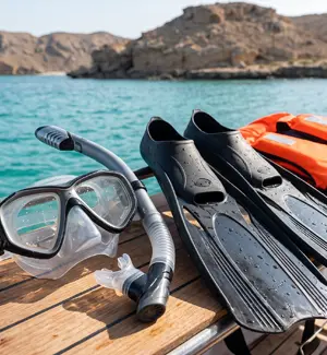 Snorkeling mask, fins and life jacket set up on the Daymaniyat boat