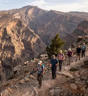 Hikers exploring trails on Jebel Shams in Oman