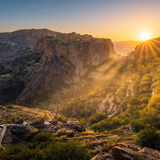 Sunrise over a hidden plateau in the Omani mountains