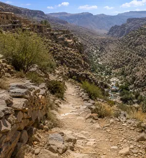 Rough track leading down from Al Ayn towards the upper pools of Wadi Damm