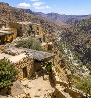 Stone houses of Al Ayn village looking down towards Wadi Damm in Al Dhahirah